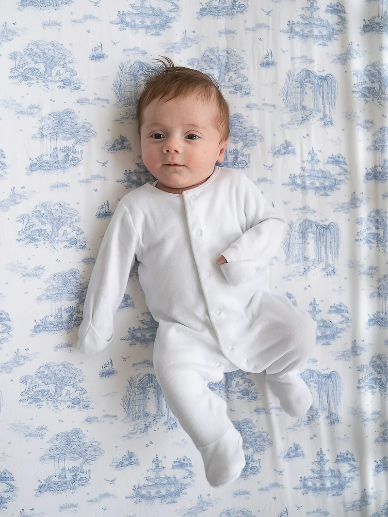 The Gilded Bird Spring Toile Blue Fitted Crib Sheet