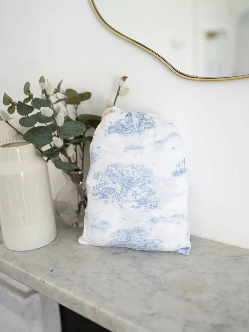 The Gilded Bird Spring Toile Blue Fitted Crib Sheet
