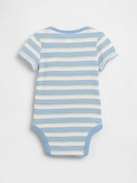Cache-couche gaufré Premiers essentiels pour Béb
