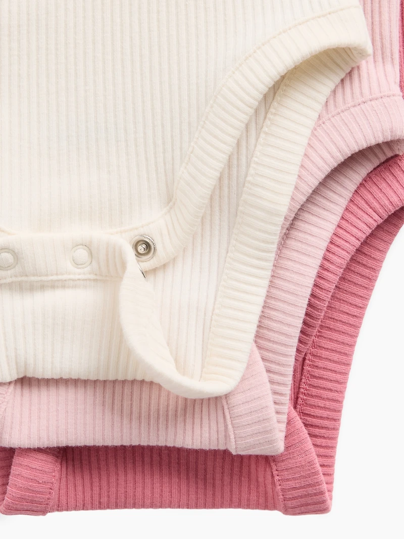 Cache-couche finement côtelé à poche Premiers essentiels pour béb