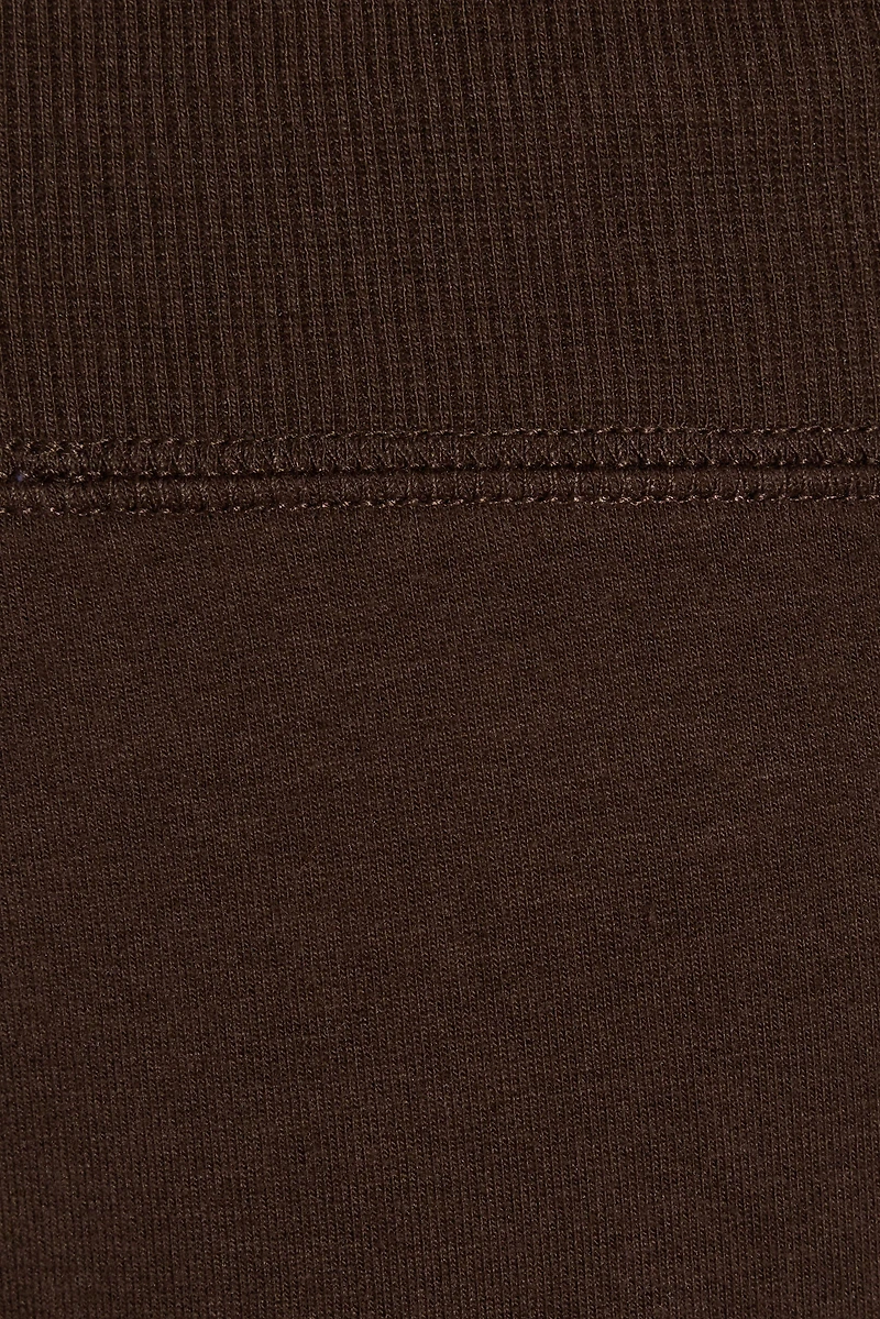 Pantalon à jambe semi-évasée en tissu éponge extensible