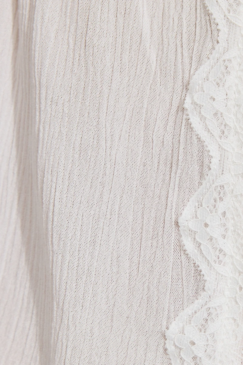 Camisole ouverte avec bordure en dentelle