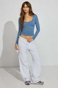 Haut doux à col échancré et manches longues