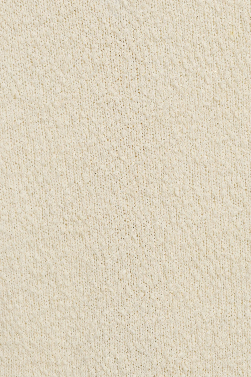 Haut polo bouclé à manches courtes