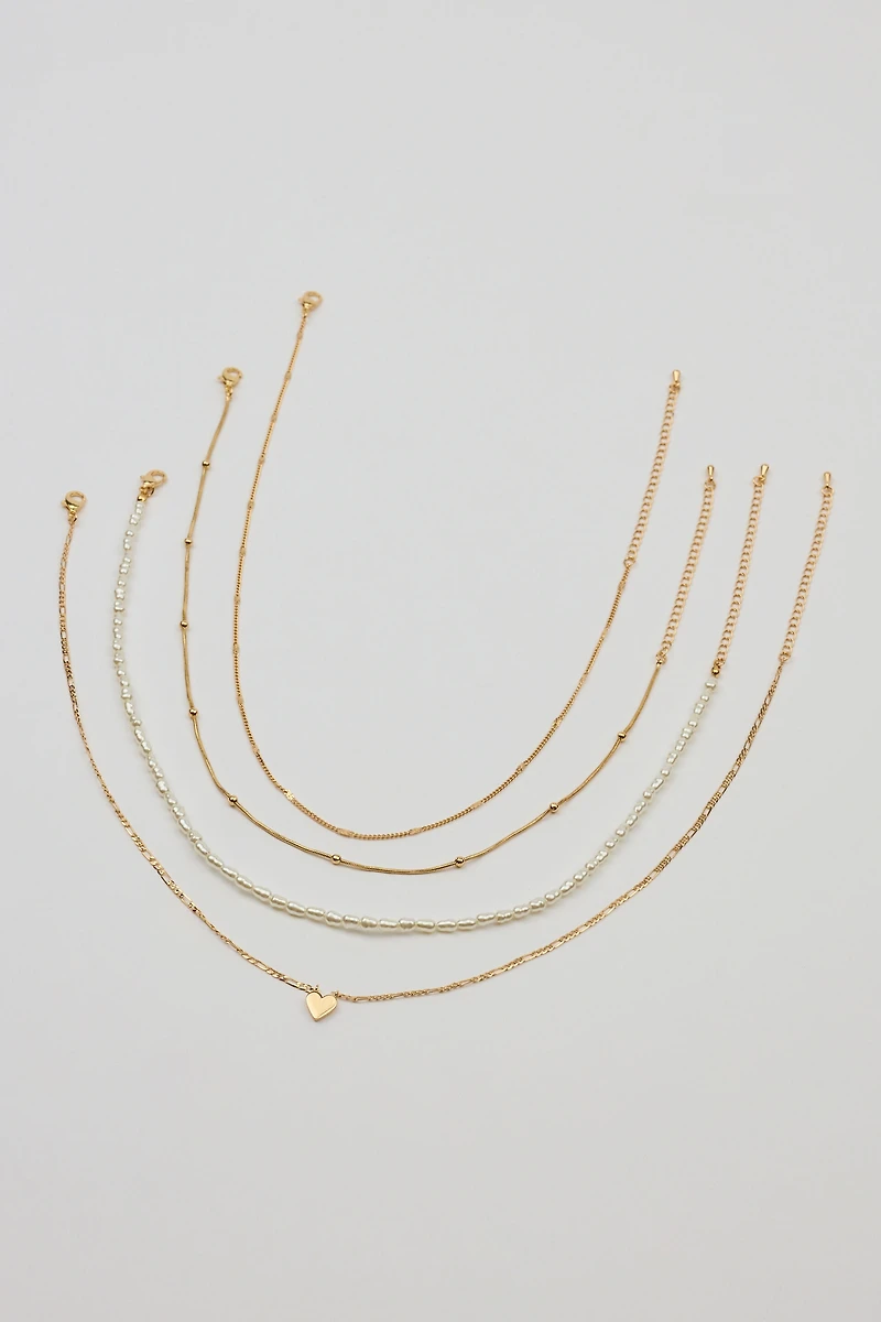 Ensemble de 4 colliers à perles et cœur