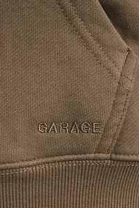 Haut à capuchon zippé emblématique en SoftTerry