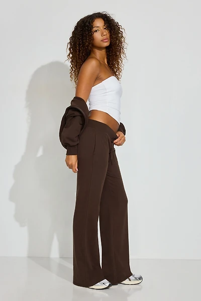 Pantalon à jambe semi-évasée en tissu éponge extensible