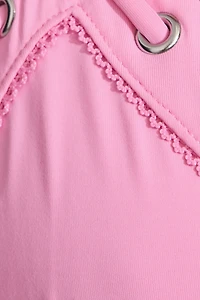 Bas de bikini brésilien avec cordons sur le côt