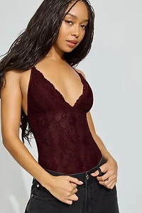 Justaucorps plongeant en dentelle croisé au dos