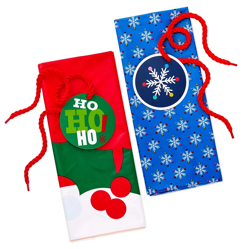 56" Snowflakes and Santa Face 2-Pack Giant Plastic Christmas Gift Bags for only USD 10.99 | Hallmark