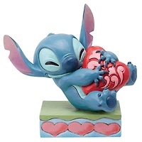Jim Shore Disney Stitch Hugging Heart Figurine, 5" for only USD 57.00 | Hallmark