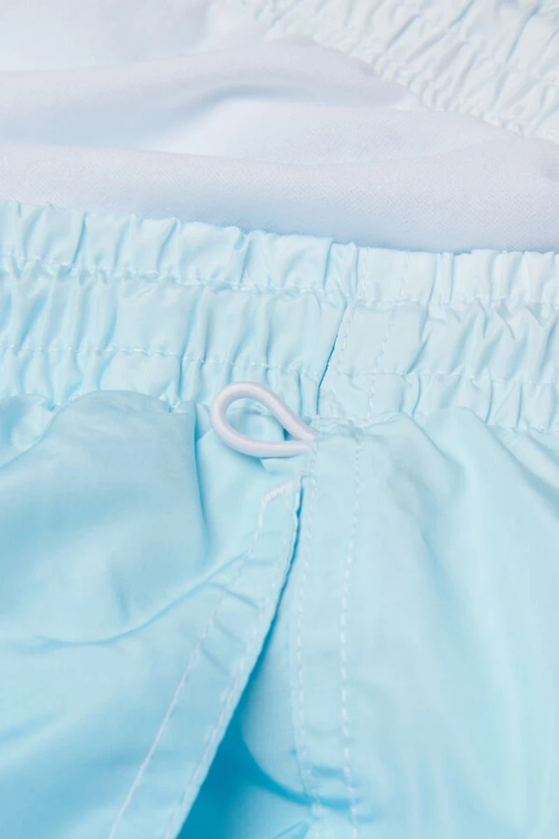 Blurry Blue Print Swim Trunks