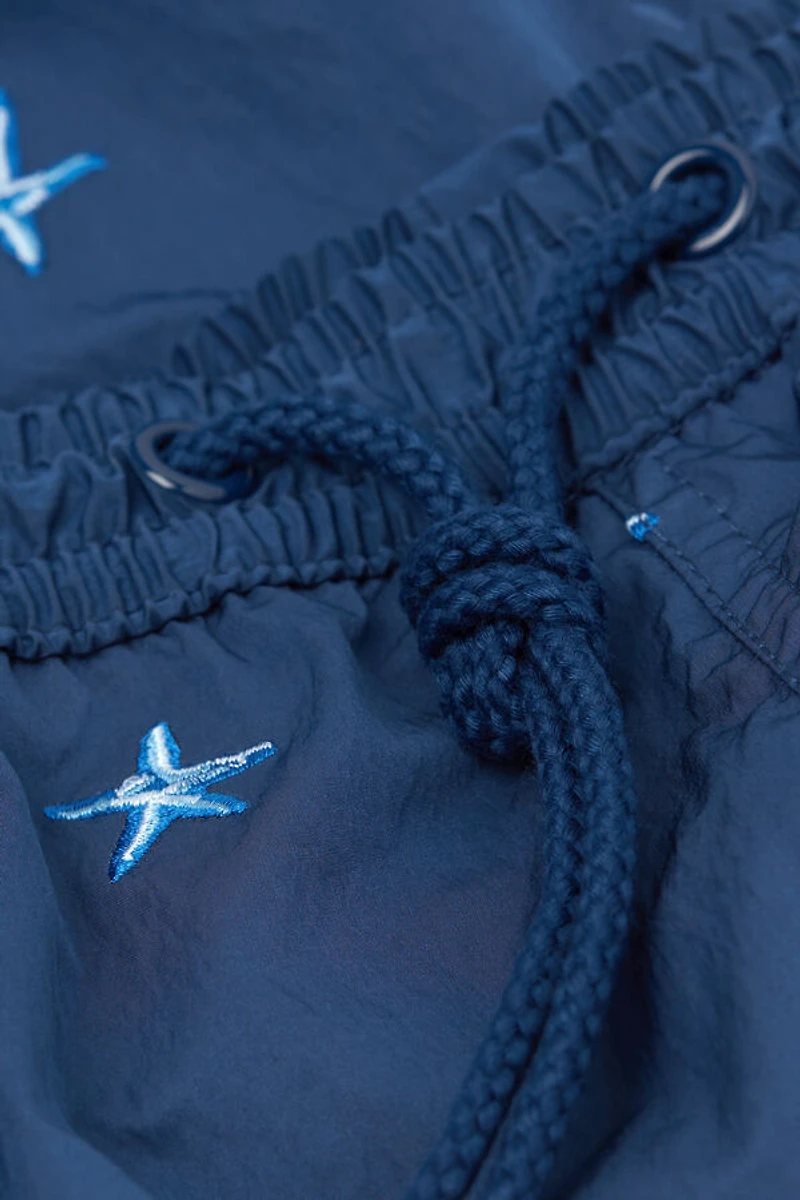 Embroidered Starfish Swim Trunks