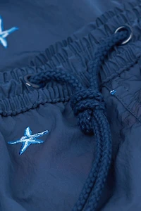 Embroidered Starfish Swim Trunks