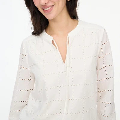 Long-sleeve eyelet tie-neck top