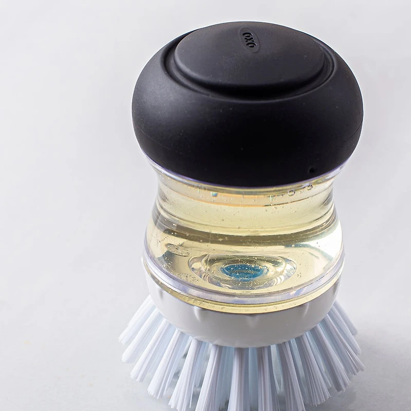 OXO Good Grips Soap Dispensing Palm Brush