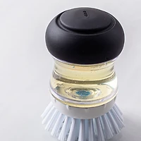 OXO Good Grips Soap Dispensing Palm Brush