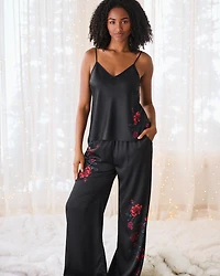 Pantalon en satin imprimé roses rouges