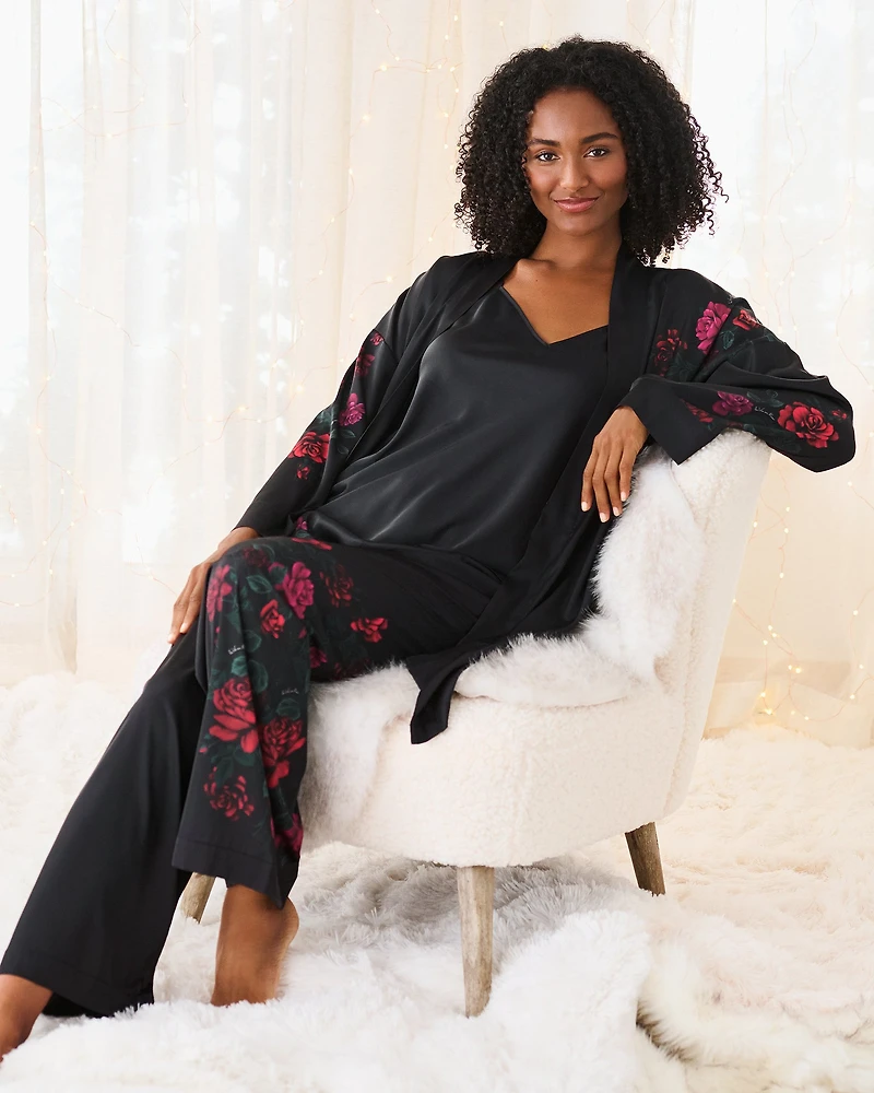 Pantalon en satin imprimé roses rouges