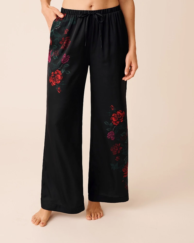 Pantalon en satin imprimé roses rouges