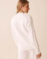 Chandail en tricot manches longues torsadées