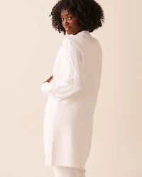 Cardigan long en tricot manches longues torsadées