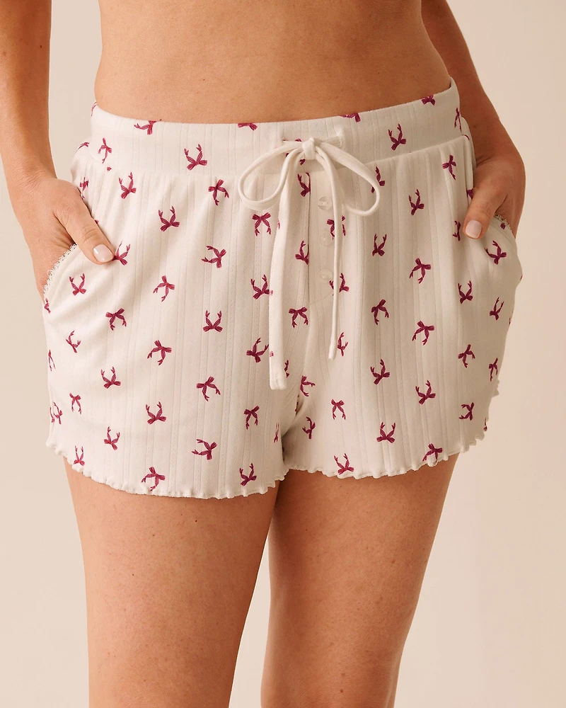 Short de pyjama en pointelle imprimé nœuds rouges