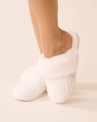 Pantoufles en tricot torsadé et fausse fourrure