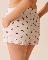 Short de pyjama en pointelle imprimé nœuds rouges