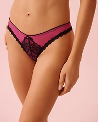 Culotte tanga en dentelle et résille