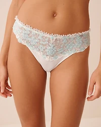 Culotte brésilienne en résille brodée à volants