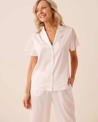 Chemisier en satin et chiffon à perles