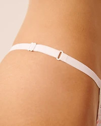 Culotte string ajustable en dentelle et microfibre
