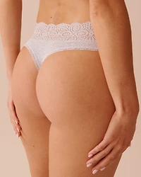Culotte tanga côtelée bordure de dentelle