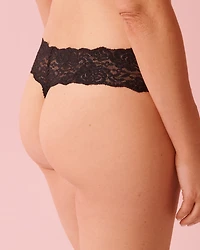 Culotte tanga microfibre et large bande de dentelle
