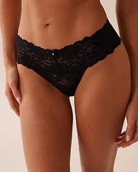 Culotte tanga dentelle à large bande de taille