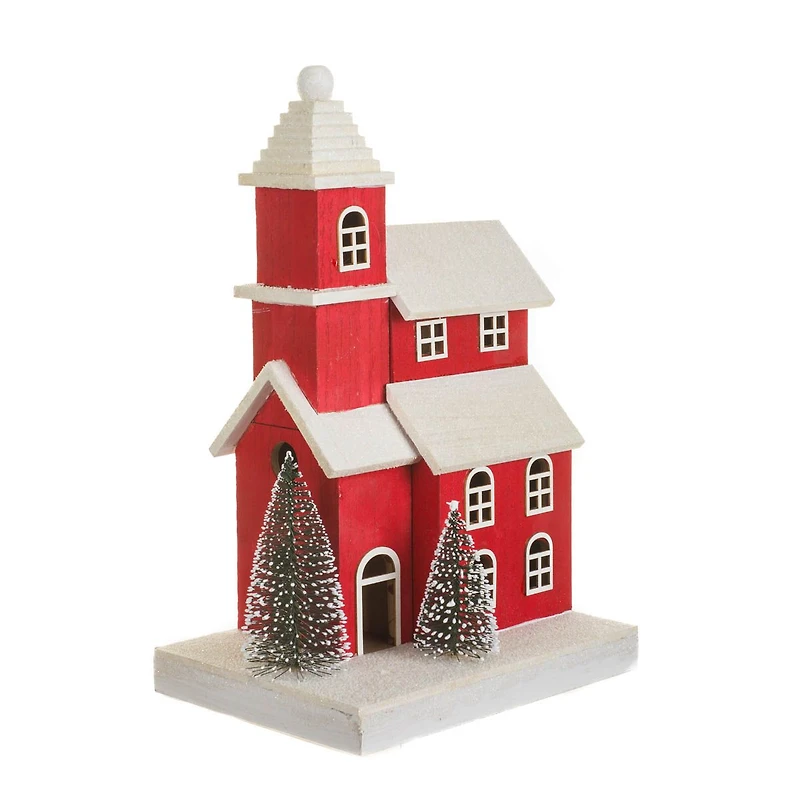 Maison en bois rouge et blanc givré avec affichage DEL et sapins