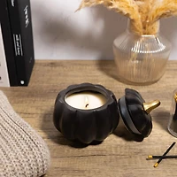 Black ceramic pumpkin candle