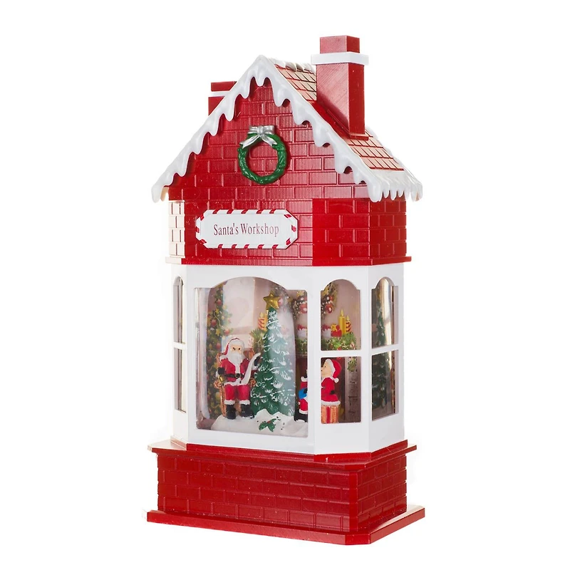 Boule à neige suspendu en plastique rouge atelier du Père Noël avec DEL et paillettes