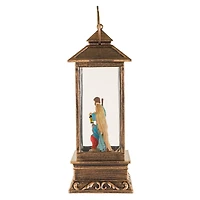 Lanterne musicale en plastique bronze avec DEL blanc chaud Boule à neige famille voyageuse