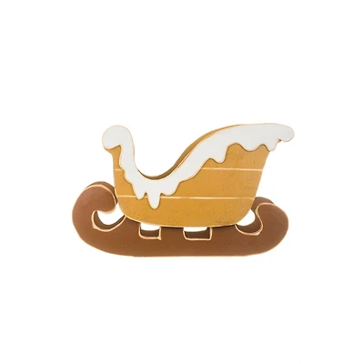 Snow-Covered Brown Sled