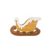 Snow-Covered Brown Sled