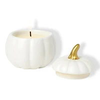 White ceramic pumpkin candle