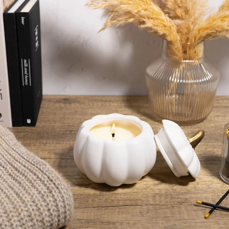 White ceramic pumpkin candle