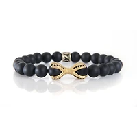 Bracelet onyx noir avec griffes or par Luenzo