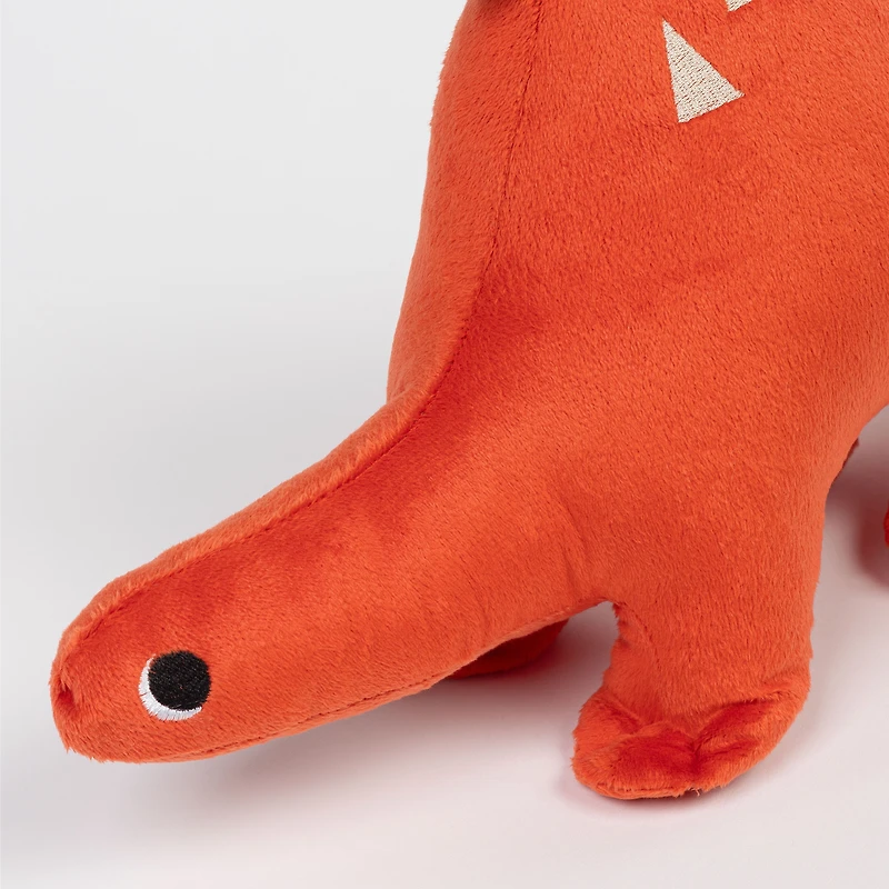 Coussin dinosaure rouge