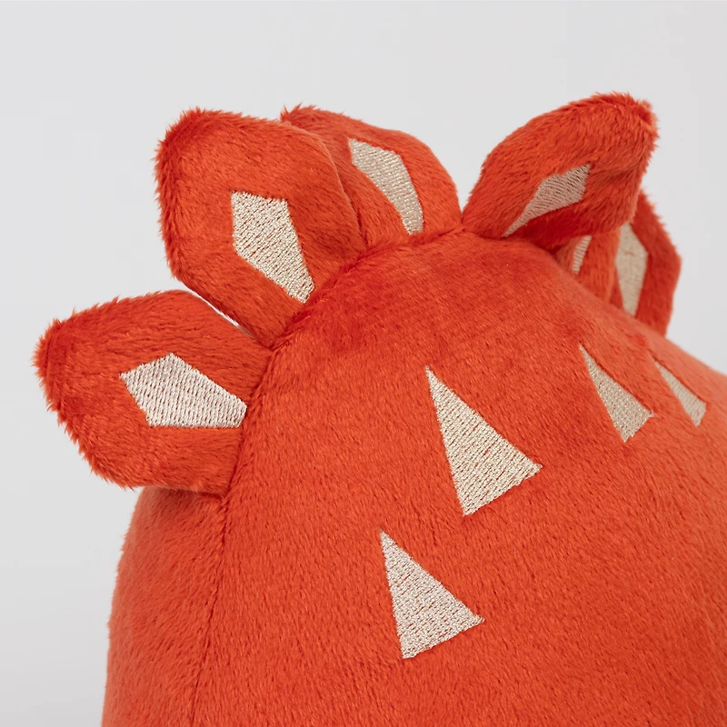 Coussin dinosaure rouge