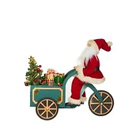 Figurine Père Noël « Livraison spéciale » en tissu sarcelle avec DEL et charrette en bois