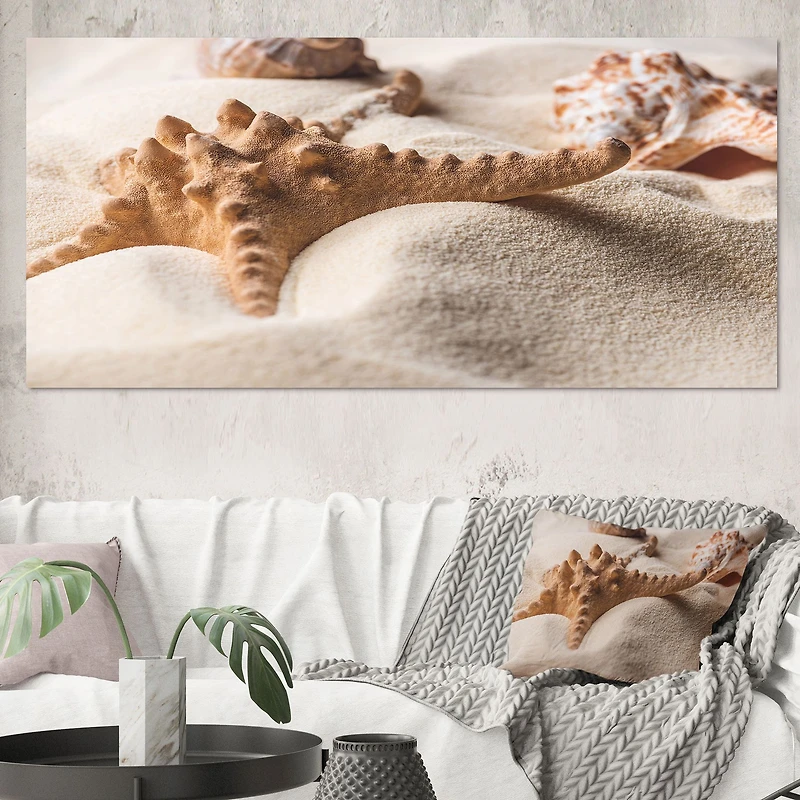 Close Up of Starfish and Seashell on Light Sand Canvas Wall Art Print
