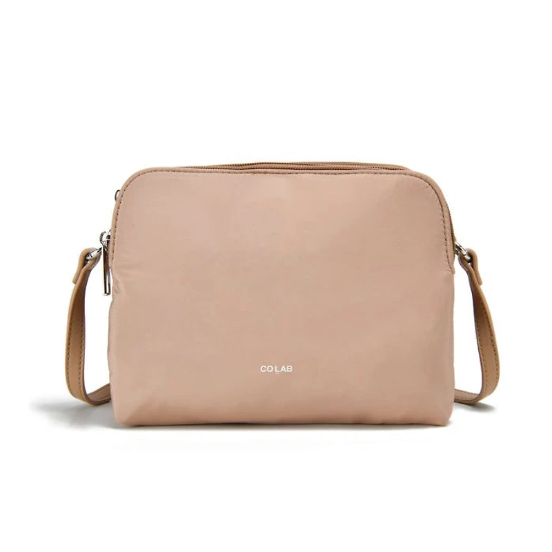Le sac à dos à bandoulière MICAH en nylon
